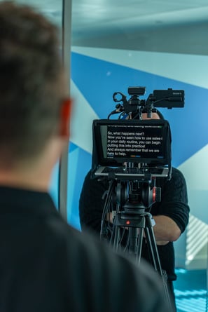 Toby reads to camera from an autocue