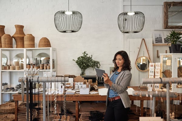 asian-woman-30s-tablet-homewares-shutterstock_1727448169